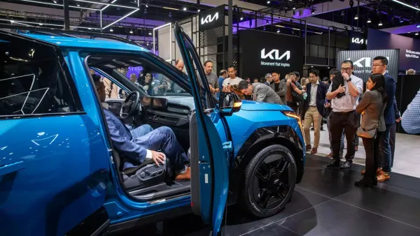 A blue Kia SUV on display at the Los Angeles Auto Show in 2023.