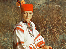 A girl in a celebratory hat