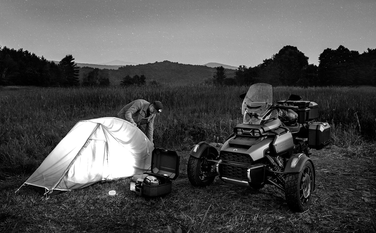 2025 Can-Am Canyon 3-wheel vehicle in the middle of a field