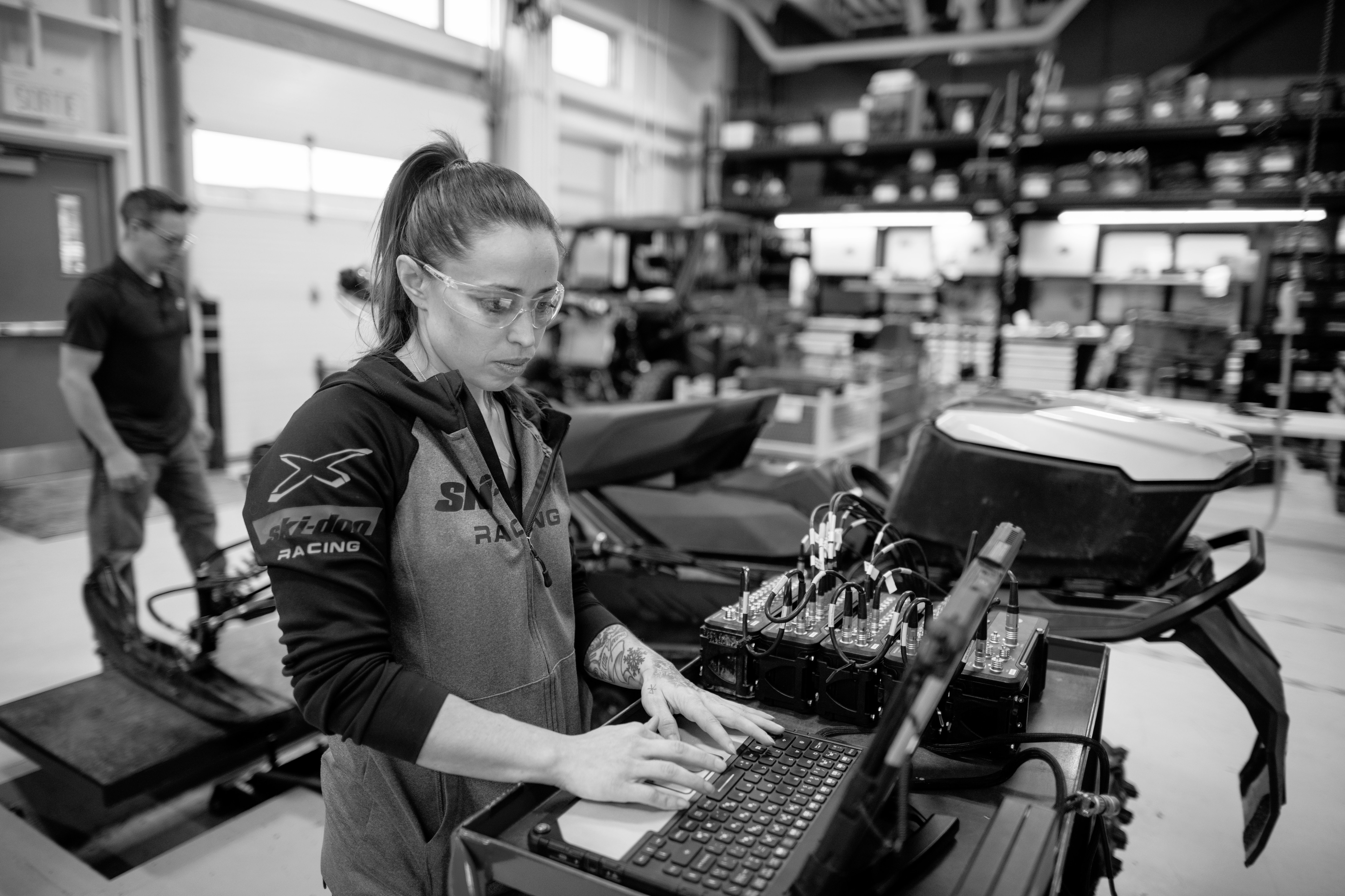 Woman working in a Can-Am manufacturing facility