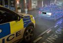 Police pull over black BMW covered in Christmas lights in Aylesbury