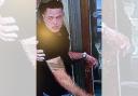 CCTV released of a man police would like to speak to after a window was punched and smashed in Beaconsfield