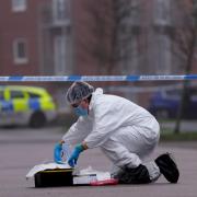 Forensics teams spent hours examining the scene on Thursday (Joe Giddens/PA)