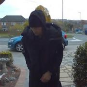 Doorbell footage after a parcel is stolen on Hatters Lane.