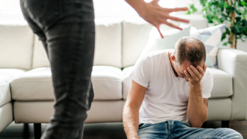 Woman beating up her husband illustrating domestic violence