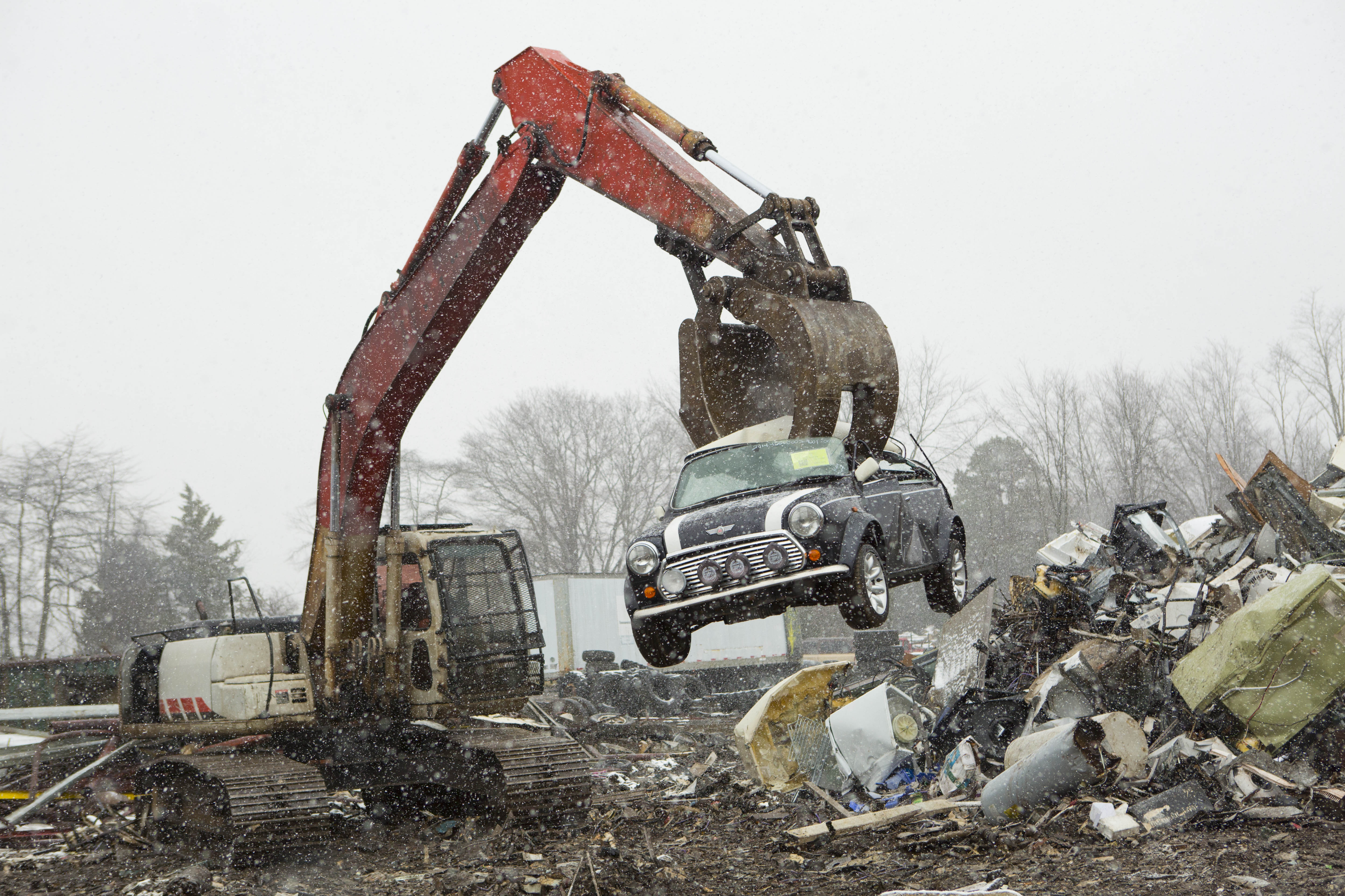 U.S. Customs and Border Protection in conjunction with British Authorities destroy a Mini Cooper that had many violations related to importation. Photo Credit: James Tourtellotte.