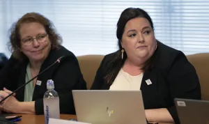 CBP COAC members Mary Hodges, left, and Angela Cook listen to a presentation at the Dec. 13