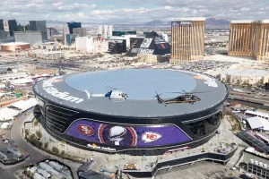 CBP Air and Marine Operations UH-60 Black Hawk and an Airbus AS350 A-Star helicopter conduct a flyover of the stadium.