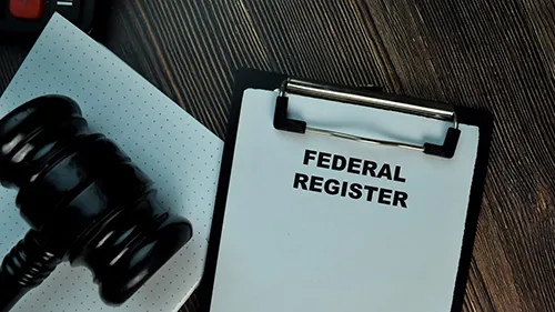 Table with gavel and clip board with Federal Notice typed on a piece of paper