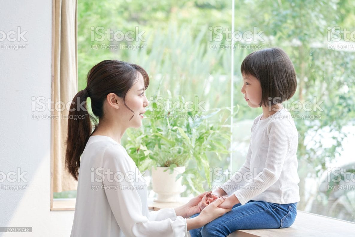 Asian mother talking with the daughter