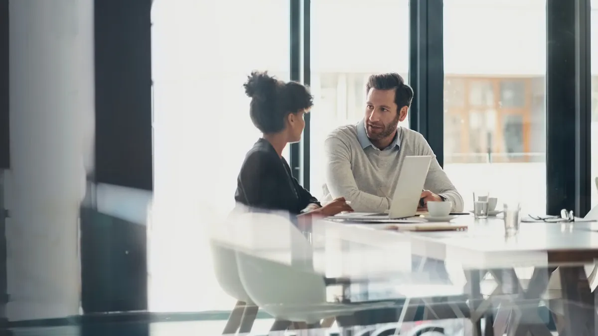 Business people in meeting, partnership and planning strategy in conference room