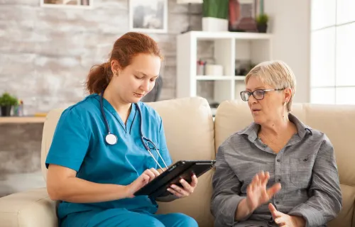 Surgeons looking at tablet device