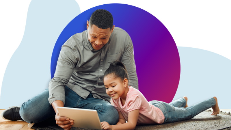 decorative photo of a father and daughter looking at a tablet