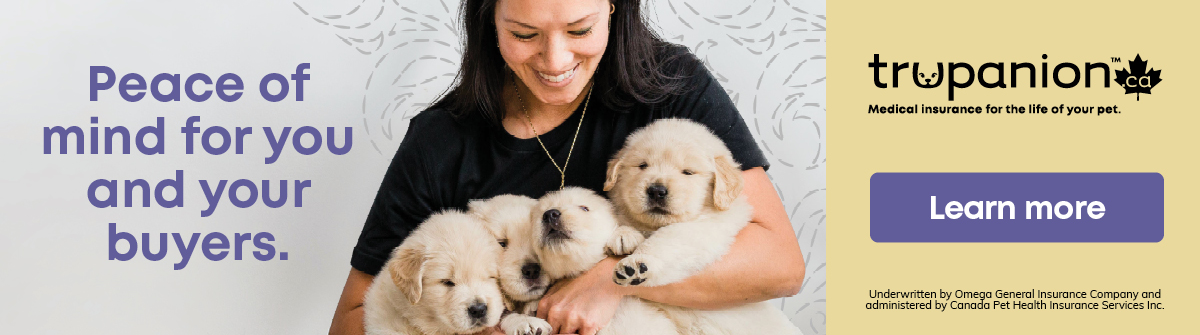 Advertisement for Trupanion; Woman holding Puppies