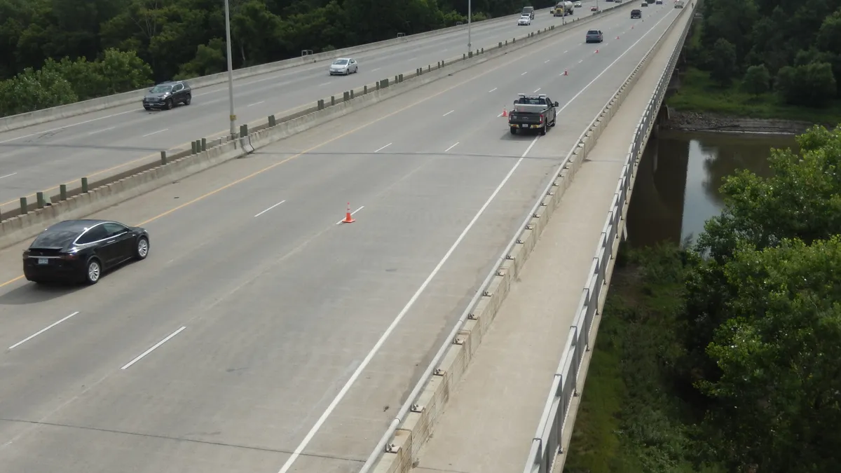 Traffic streams over the 1-494 bridge across the Minnesota River.