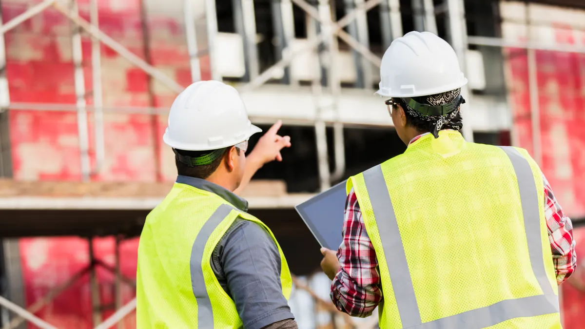 Construction workers talking