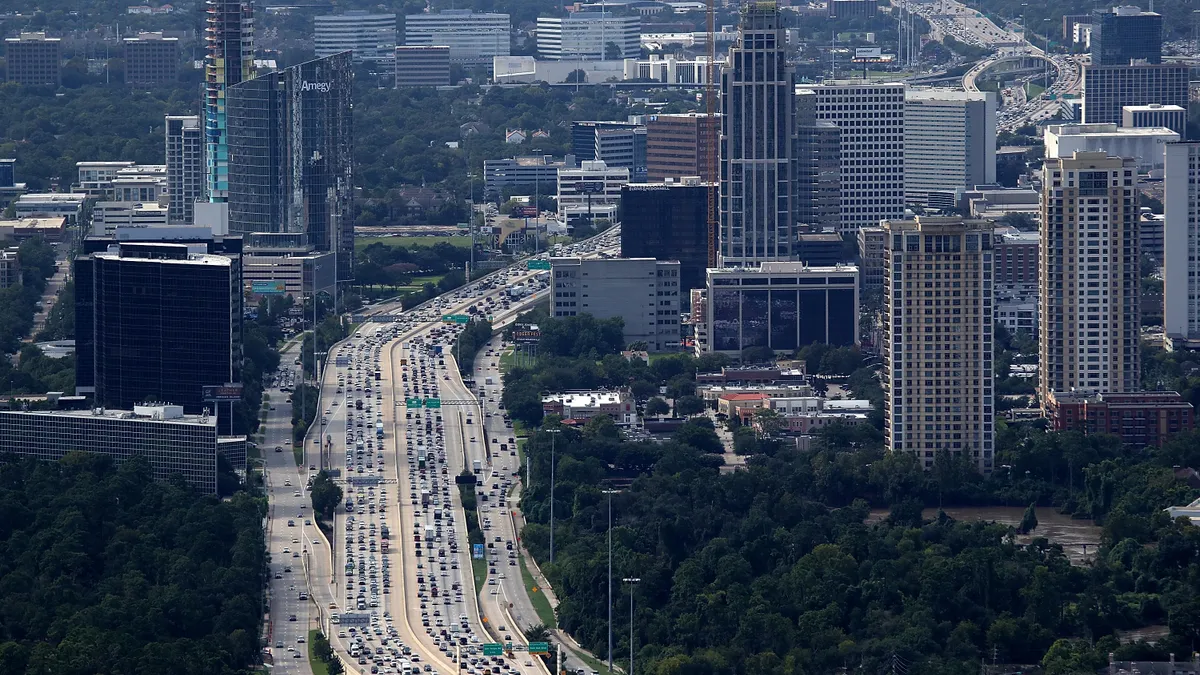 houston texas skyline with traffic on highway