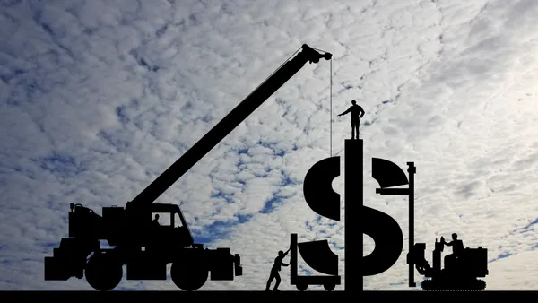 an illustration of construction equipment building a dollar sign