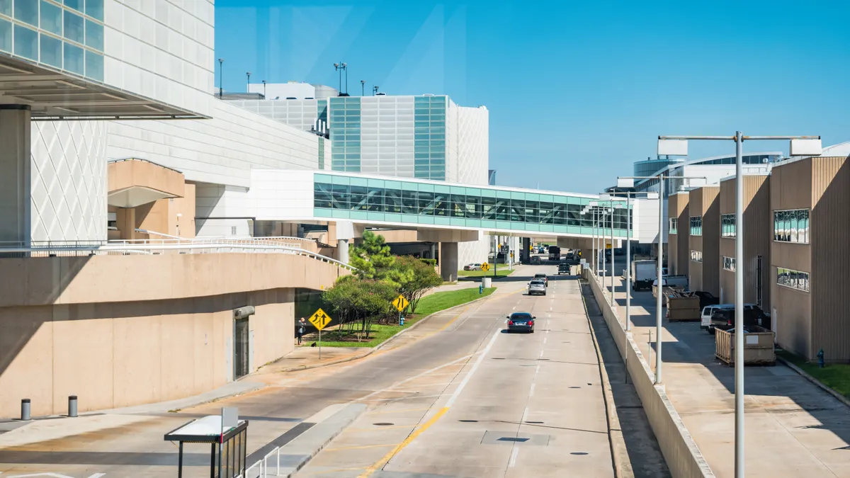 A photo shows the entrance to George Bush Intercontinental Airport in Houston.