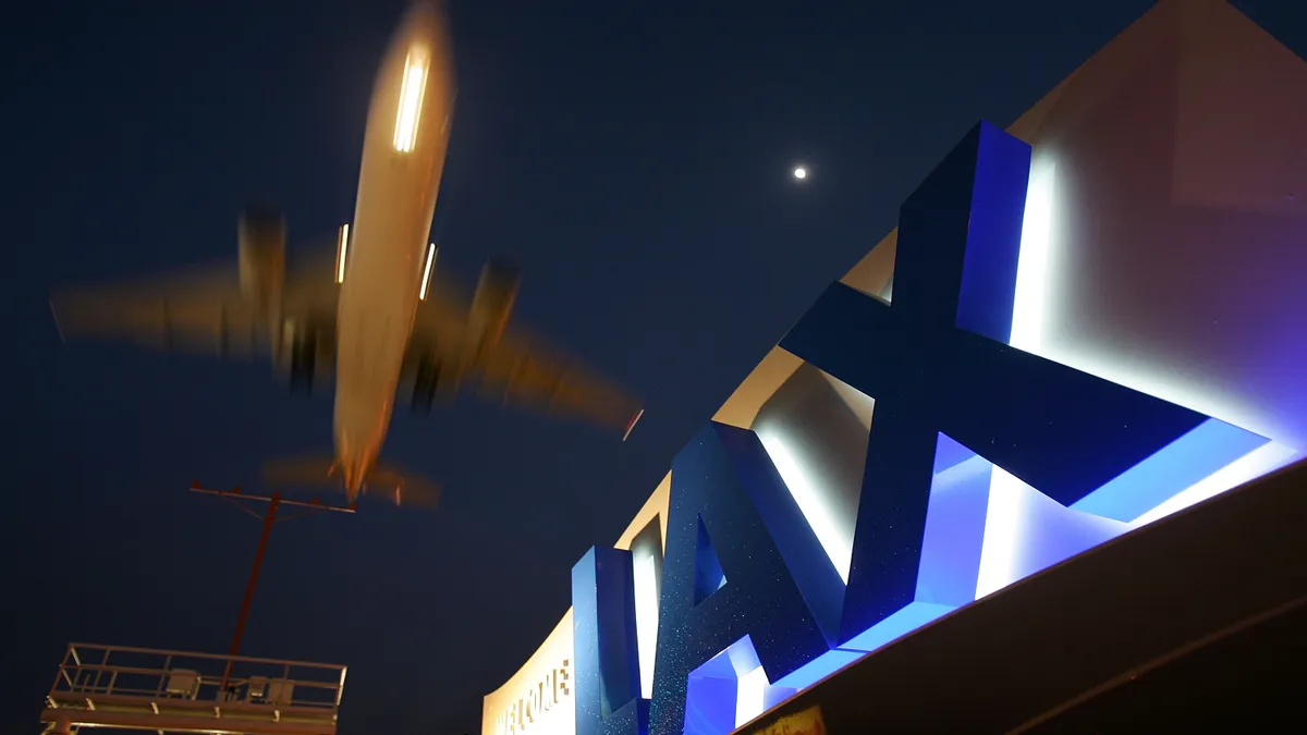 A jet comes in for a landing at Los Angeles International Airport.