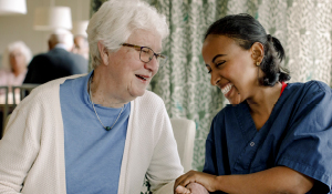 Elderly patient with nurse.