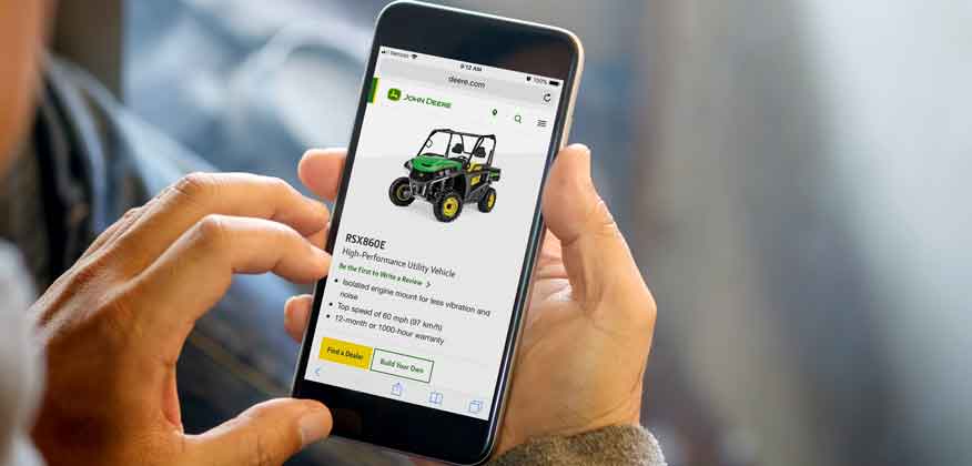 Cell phone with John Deere website on the screen