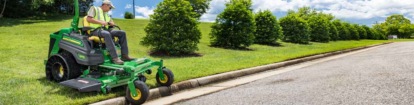 Man mowing with a John Deere Zero Turn Mower