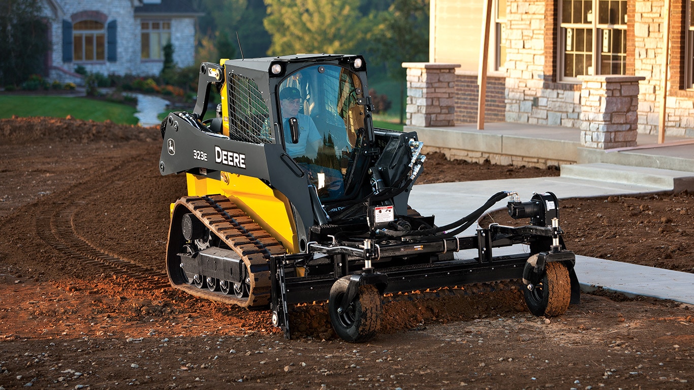 Power Rake Attachment on 323E Compact Track Loader