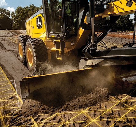 A John Deere MotorGrader with SmartGrade moves dirt on the job site.