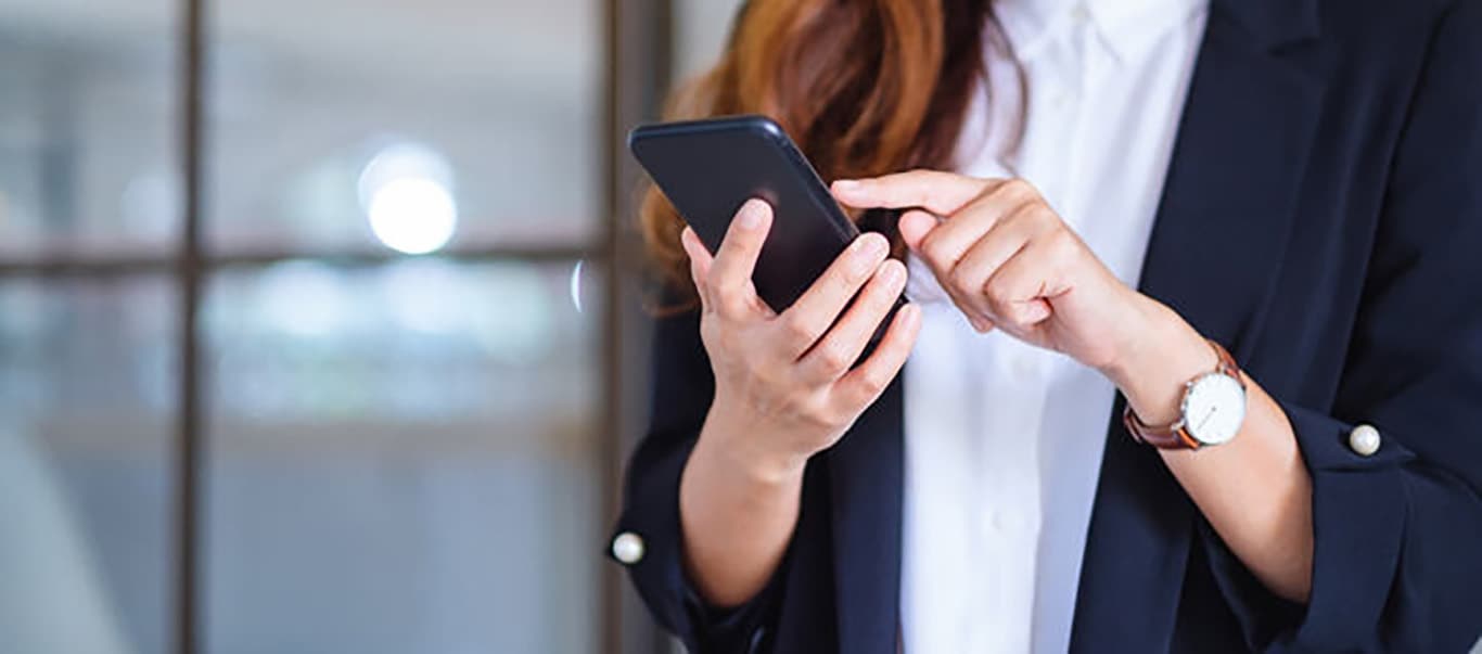 lady holding a mobile phone