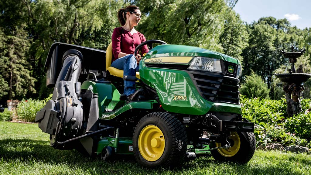 image of bagger system attached to lawn tractor