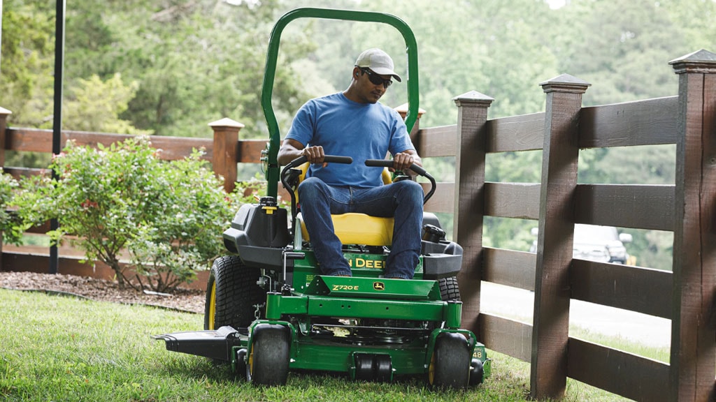 Man driving a Z720E Mower