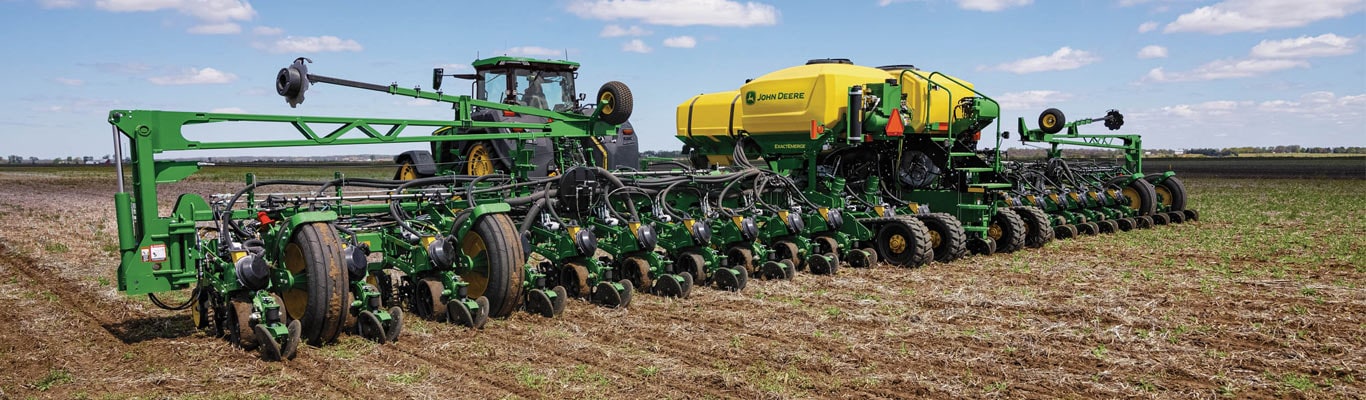 Photo of John Deere planter in field