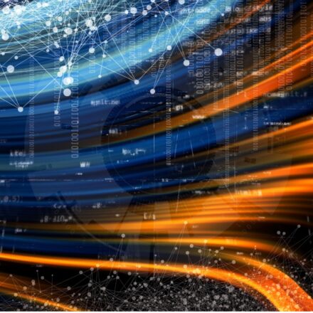 Digitally generated abstract image of data in motion in streaks of colors, primarily blue, sky blue and dark orange against a black background. Connected data points can be seen in the foreground.