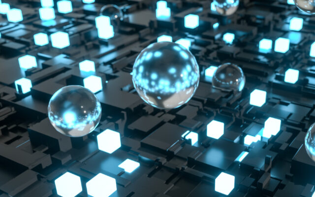 Digital image of spheres with blue lights on a high tech motherboard platform.