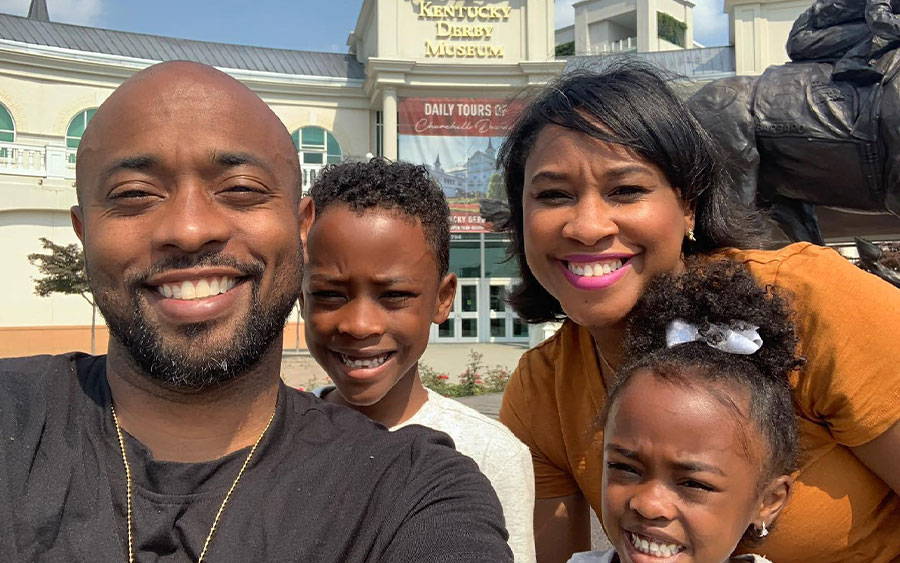 Family out front of the Museum