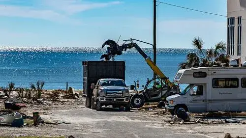 Heavy machinery being used to clean disaster area