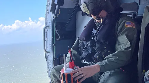 USCG engineer deploying a bouy