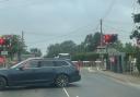 A stuck level crossing is causing disruption once again to one village