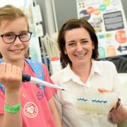 Baylee Crawford, nine, with Dr Rachael Stanley at the STEMM Village at last year’s show