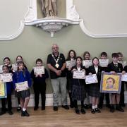 As part of Heritage Open Days in Thetford, children from Redcastle Family School and Thetford Grammar School attended an unveiling ceremony