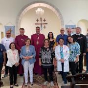 Bishop Graham with Al Ahli Hospital senior medical staff and Archbishop Hosam