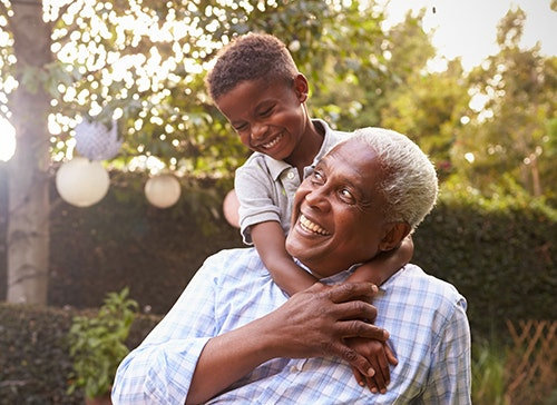 Grandson hugging Grandfather