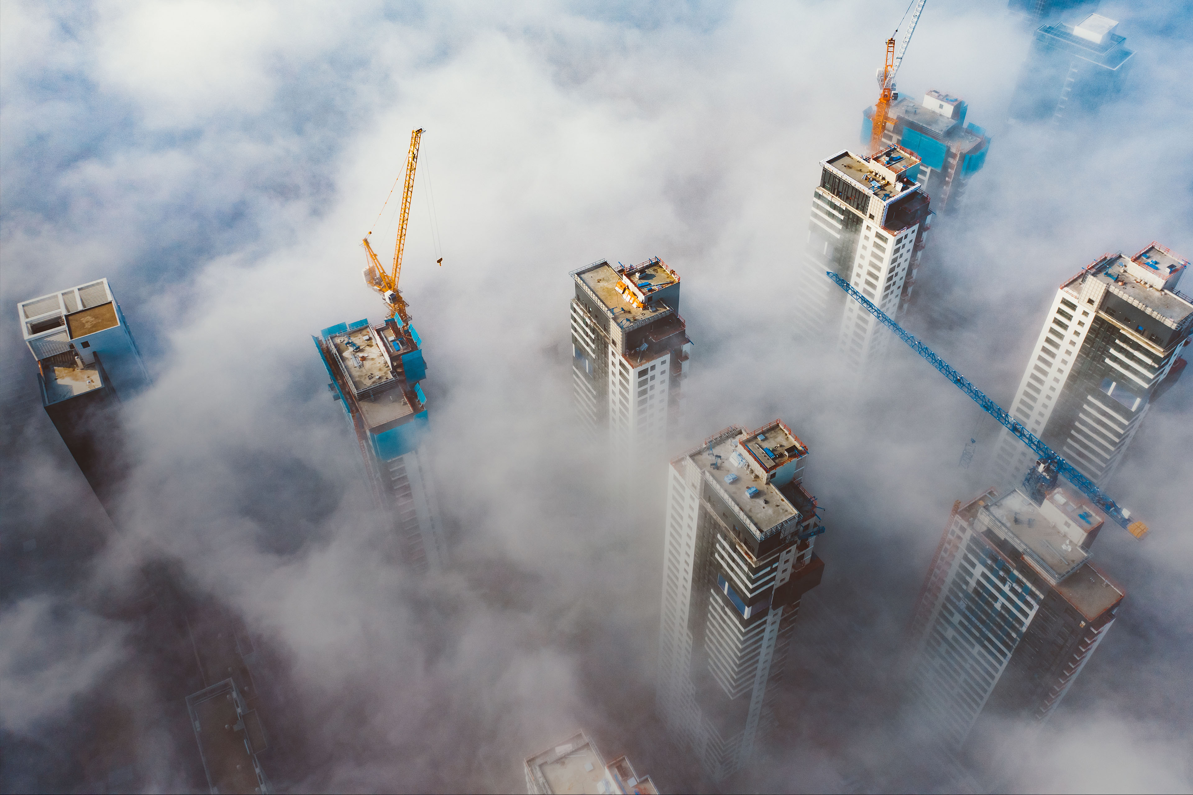 Aerial view of cityscape with clouds