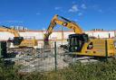 Demolition has started at a former showroom in Swindon