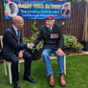 Yate mayor councillor Ben Nutland, visits local war hero, Leonard Trewin, to honour him on his 100th birthday