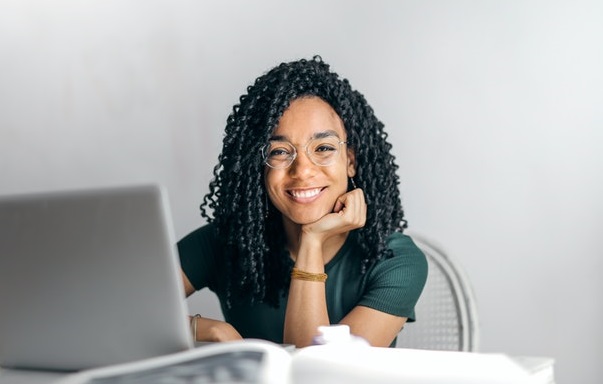 person smiling laptop