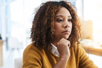 A woman deep in thought.