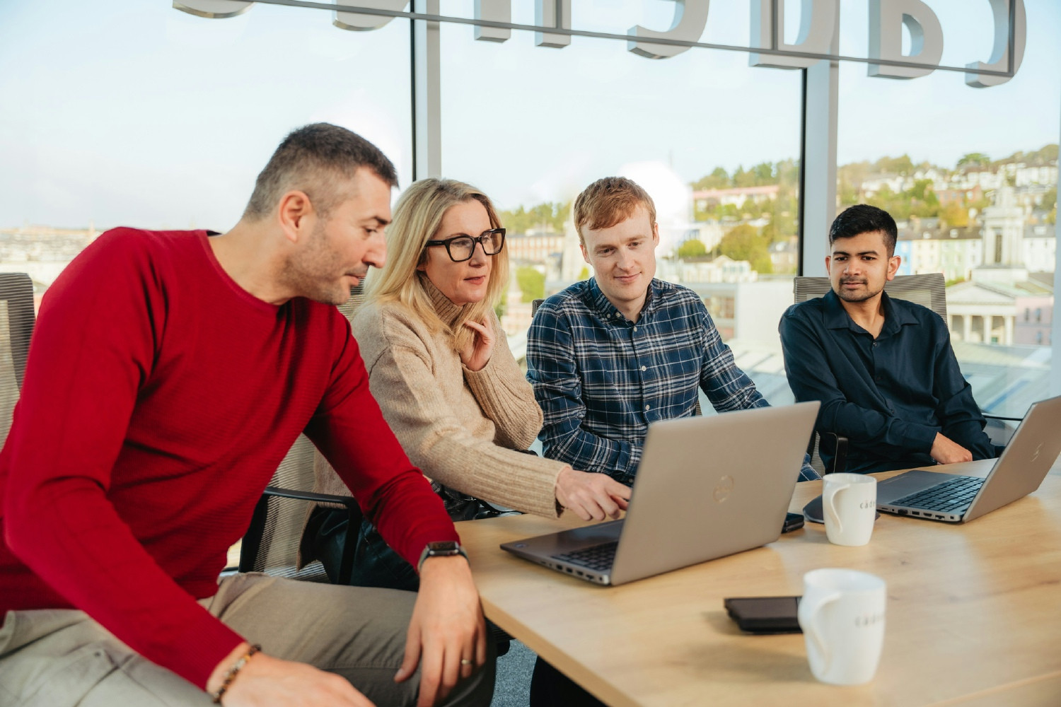 Cadence Cork employees meeting together