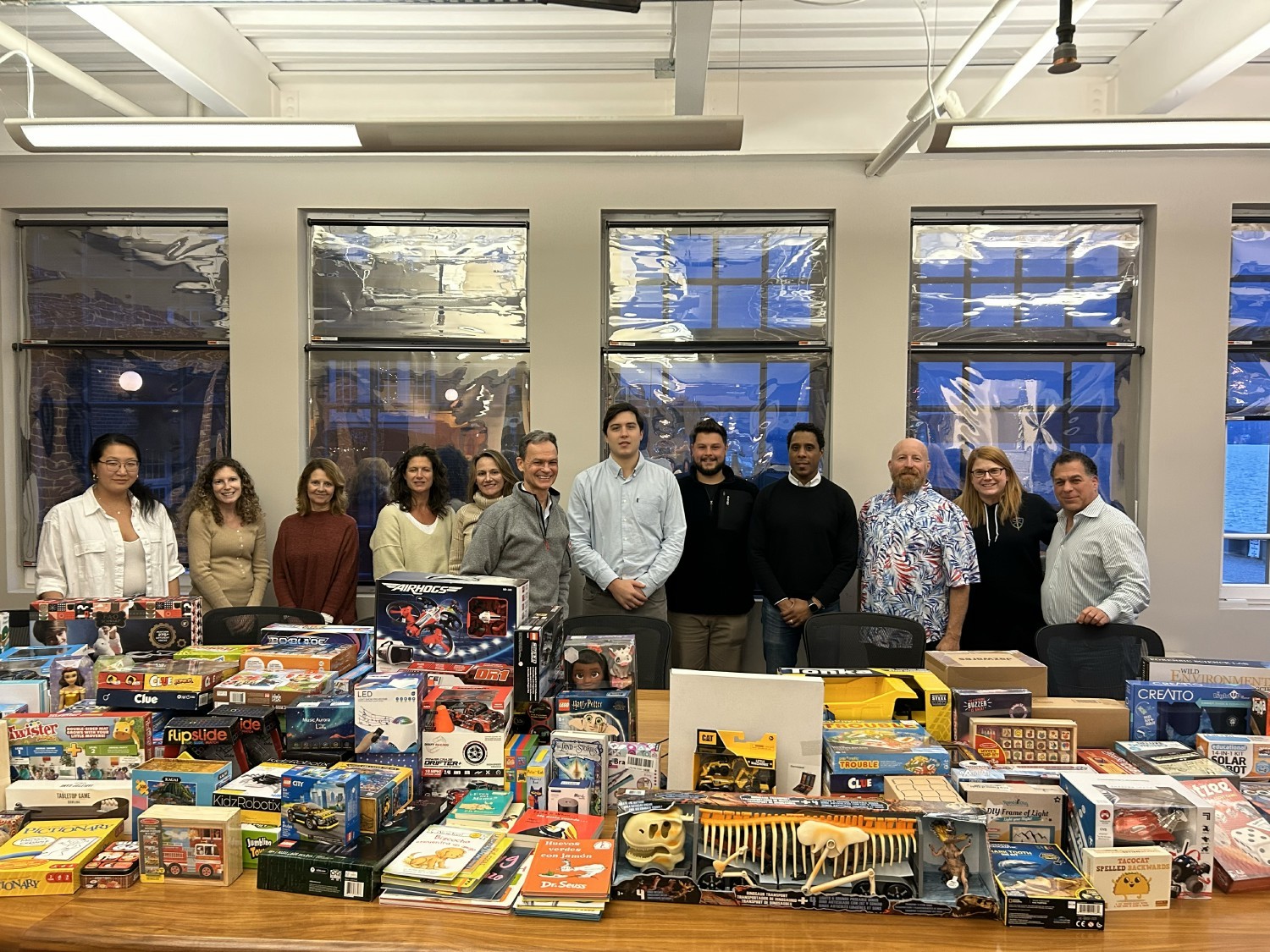 The X-Caliber Charity Crusaders are pictured here with the toys collected for the annual  drive.